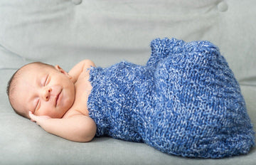 Signs You Should Stop Swaddling Your Baby